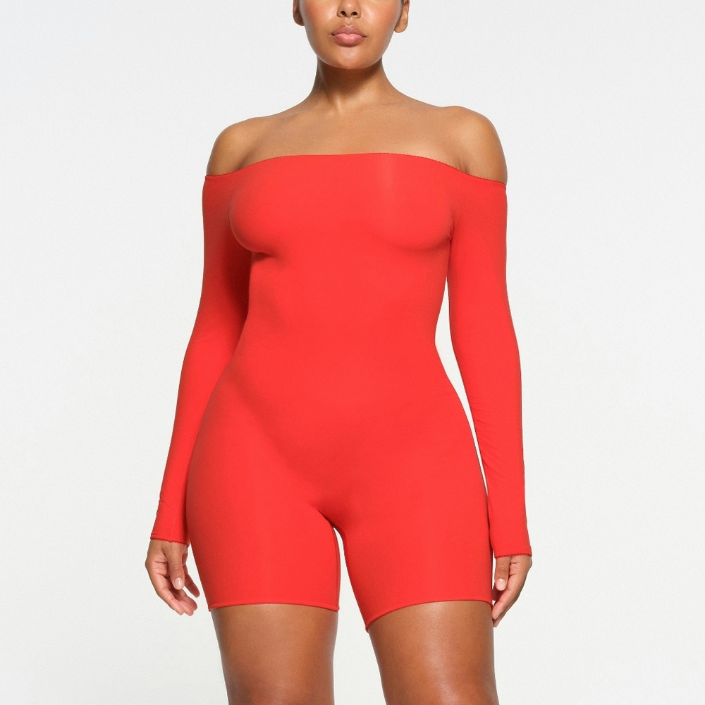 S1. NWOT SKIMS FITS EVERYBODY PICOT OFF THE SHOULDER ONESIE IN RUBY